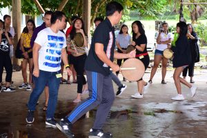 Dr. Quintero demonstrates the use of the ganza (gong).